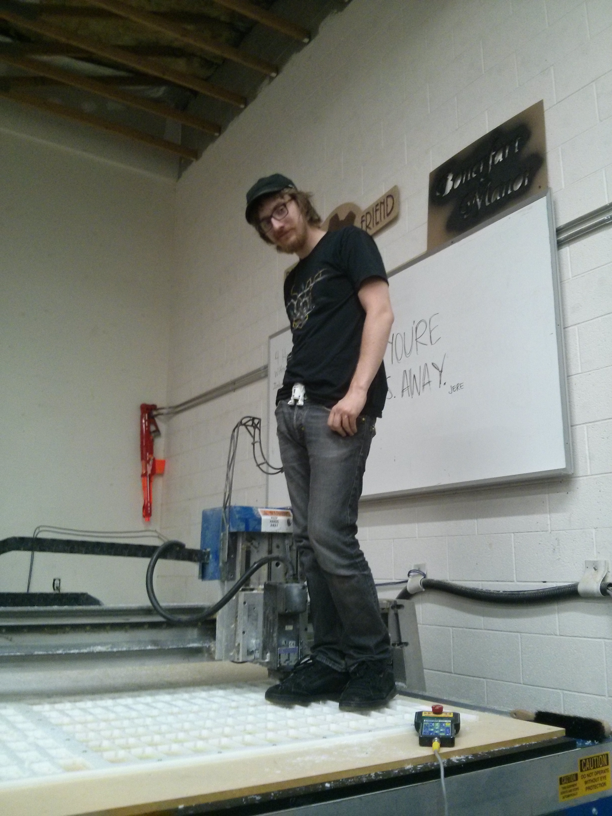 Isaac Standing on his CNC Table